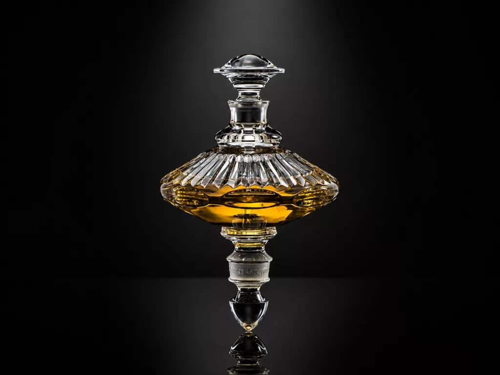 A pair of exquisite, handcrafted crystal spinning-top perfume flacons from the Henry Jacques Les Toupies collection