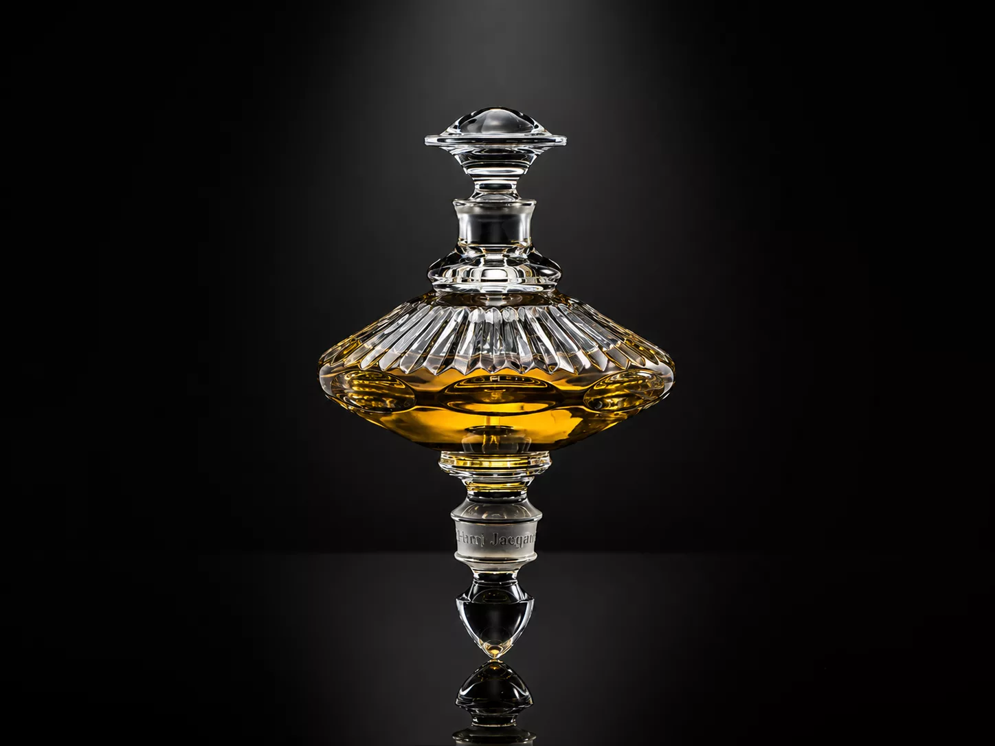 A pair of exquisite, handcrafted crystal spinning-top perfume flacons from the Henry Jacques Les Toupies collection