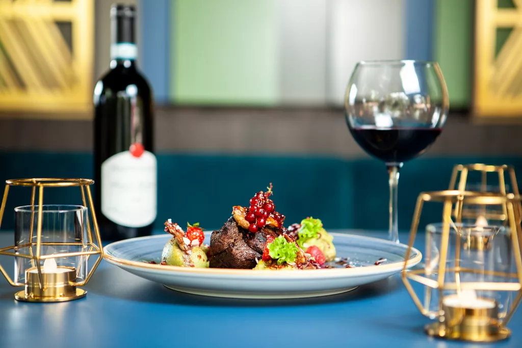 An intimate 8-seat counter dining setup at Jantra restaurant in Houston's East End