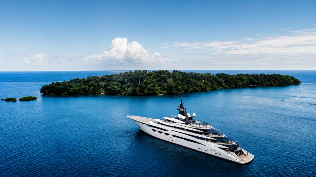 The majestic 115-meter Lürssen superyacht AHPO cruising on calm, deep blue Mediterranean waters
