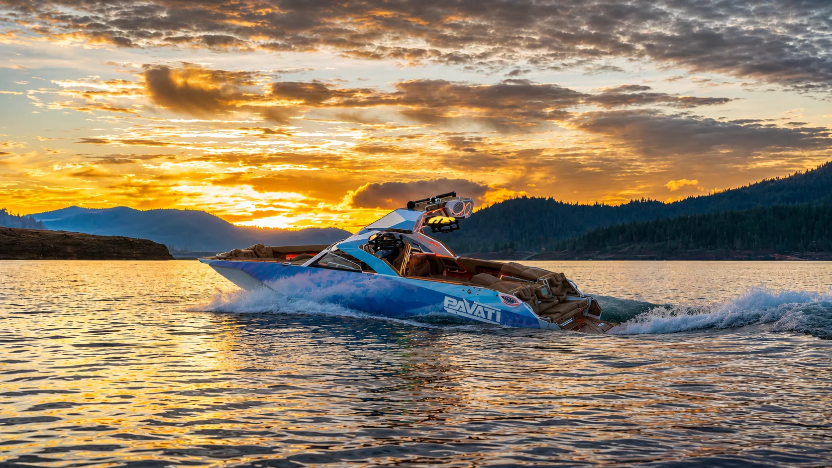 Pavati aluminum wake boat cutting through water on Houston lake